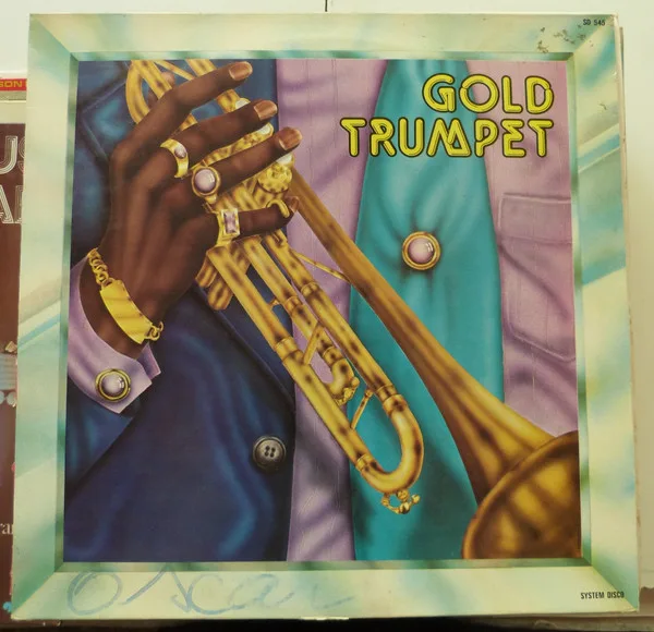 Capa de System Disco — Gold Trumpet