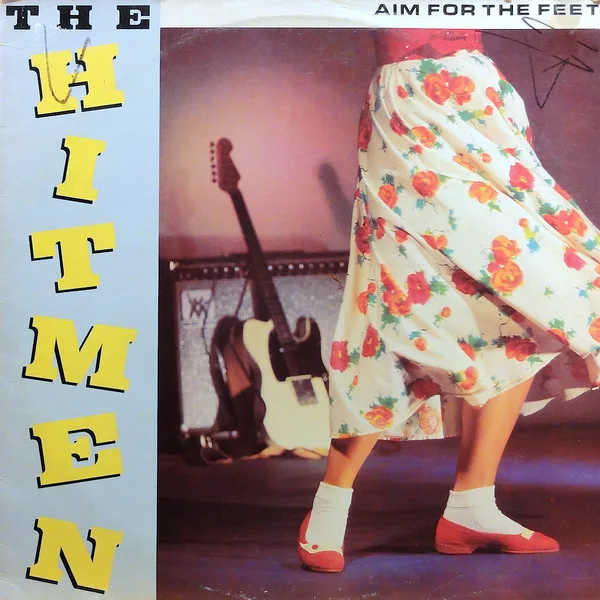 Capa de The Hitmen (6) — Aim For The Feet