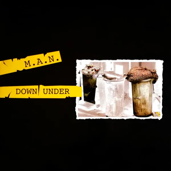 Capa de M.A.N. — Down Under