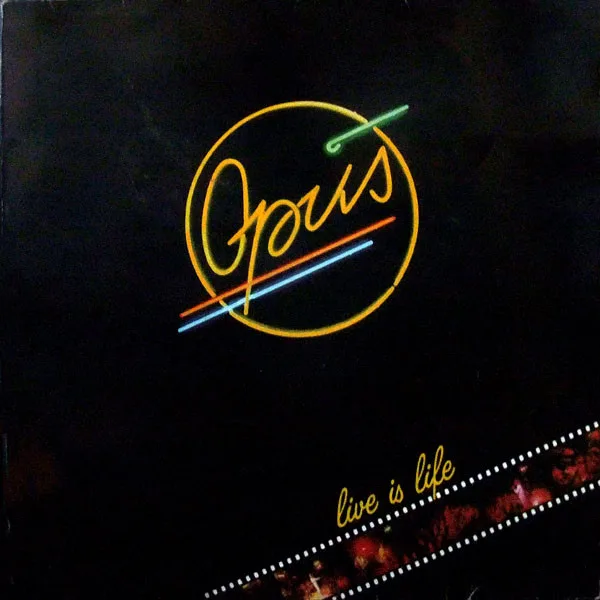 Capa de Opus — Live Is Life