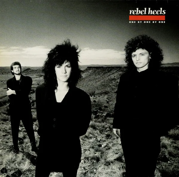 Capa de Rebel Heels — One By One By One