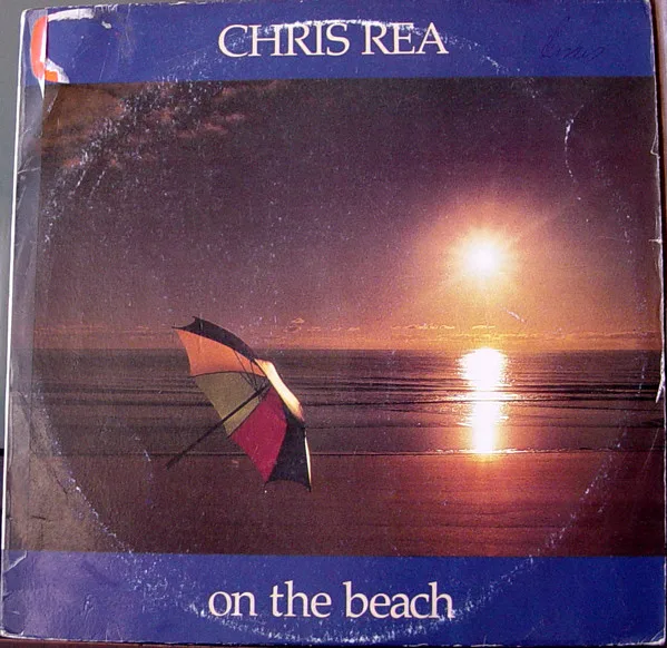 Capa de Chris Rea — On The Beach