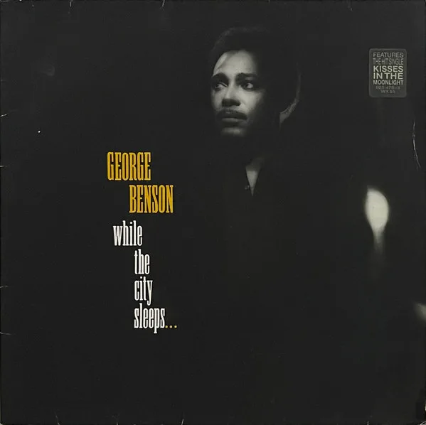 Capa de George Benson — While The City Sleeps...